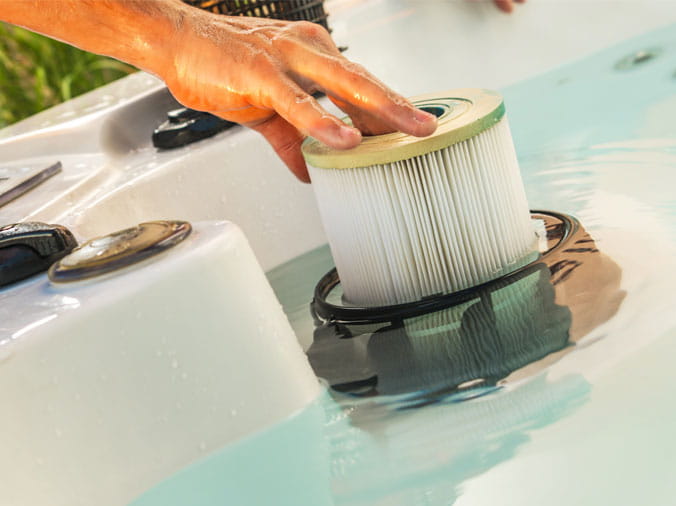 Pool filter being changed